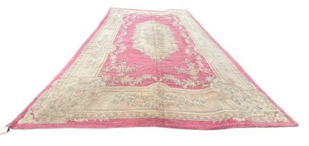 CIRCA 1908, A LARGE HOOK, PINK, WOOL PILE, BURLAP CARPET/RUG, decorated with floral pattern. (566