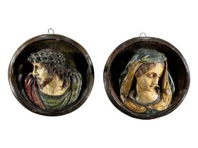 A PAIR OF DECORATIVE PLASTER WALL HANGING PLAQUES, DEPICTING CHRIST & MARY MAGDALENE. (d 17cm)