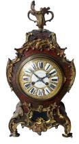 A 19TH CENTURY FRENCH GILT METAL MOUNTED TORTOISESHELL AND BOULLE WORK BRACKET CLOCK The circular