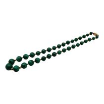 A VINTAGE 14CT GOLD AND MALACHITE BEADED NECKLACE Having graduated malachite beads interspaced by