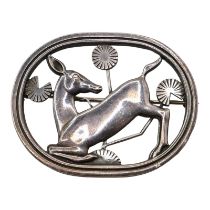 GEORG JENSEN, DANISH, A VINTAGE SILVER BROOCH OF A KNEELING DEER Designed by Arno Malinowski,