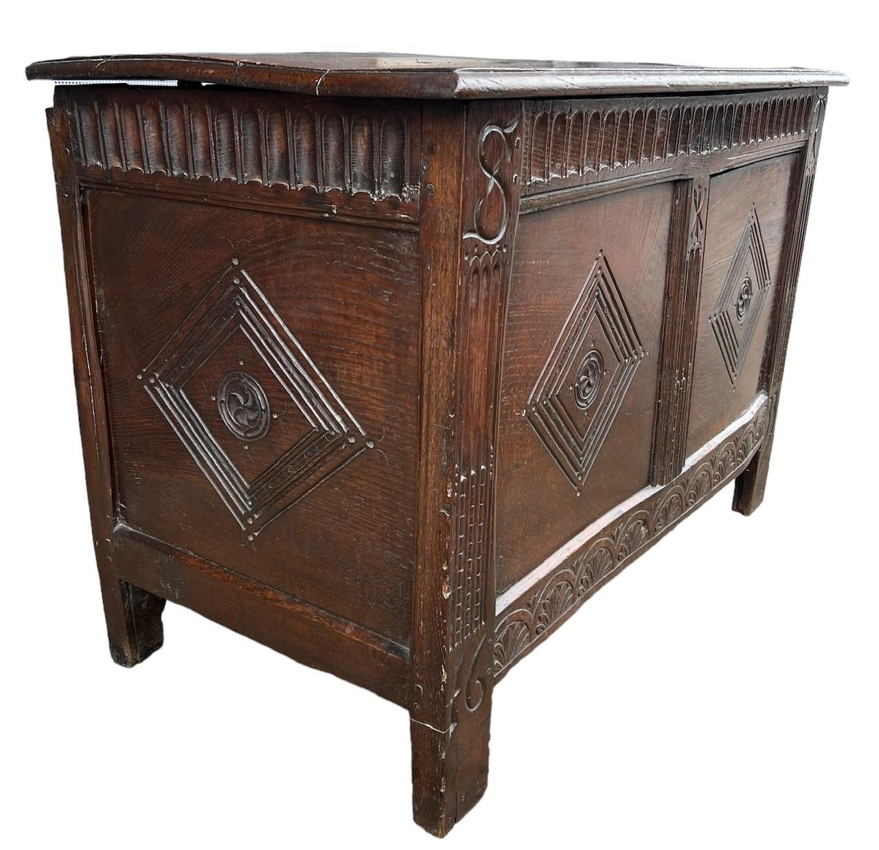 A 17TH CENTURY CARVED OAK PANELLED COFFER With hinge lid the front carved with initials ‘ST’, - Image 3 of 9