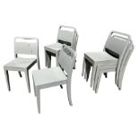 A SET OF EIGHT PAINTED DESIGNER STACKING CHAIRS.