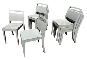 A SET OF EIGHT PAINTED DESIGNER STACKING CHAIRS.