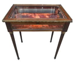 A 19TH CENTURY FRENCH MAHOGANY AND GILT METAL MOUNTED BIJOUTERIE TABLE With hinge top raised on