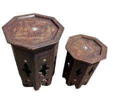 TWO MOORISH CARVED HARDWOOD AND MOTHER OF PEARL INLAID COFFEE TABLES. (largest h 50.5cm x diameter
