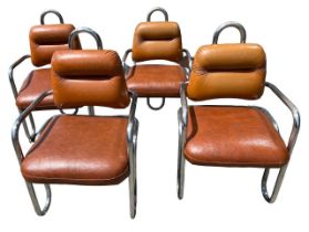 KWOK HOI CHAN FOR STEINER, FRANCE, A SET OF FOUR TUBULAR STEEL FRAMED LEATHER CHAIRS, CIRCA 1970.