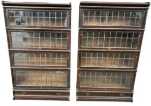 A NEAR PAIR OF OAK GLOBE WERNICKE FOUR SECTION BOOKCASE With lead glazed doors above a single