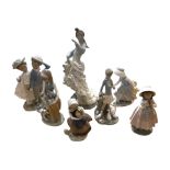 A COLLECTION OF SEVEN LLADRO AND NAO PORCELAIN FIGURES. (largest h 35cm)