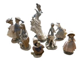 A COLLECTION OF SEVEN LLADRO AND NAO PORCELAIN FIGURES. (largest h 35cm)