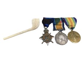 A COLLECTION OF THREE WWI MEDALS Together with late 19th/early 20th Century ceramic clay pipe,