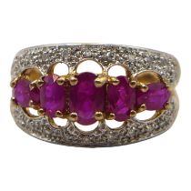 A VINTAGE 9CT GOLD AND FIVE STONE RUBY AND DIAMOND RING Having graduated row of five oval cut rubies