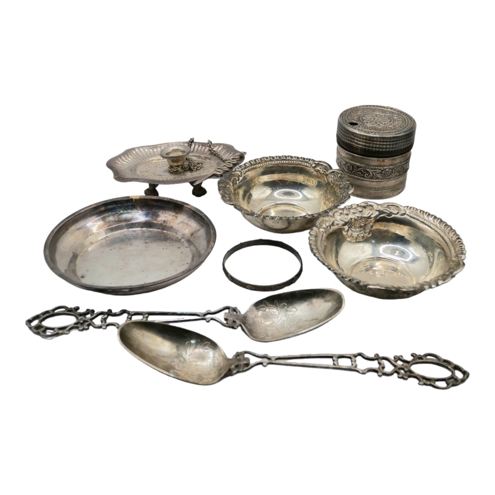 A COLLECTION OF LATE 19TH CENTURY AND LATER INDIAN SILVER ITEMS Comprising two floral repoussé