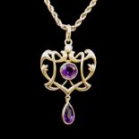 AN EDWARDIAN ART NOUVEAU 15CT GOLD, AMETHYST AND SEED PEARL PENDANT Attached to a 9ct gold rope