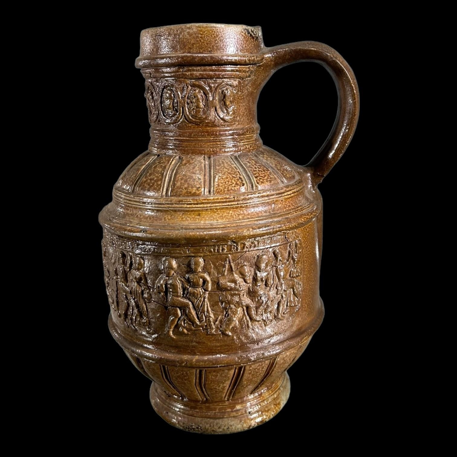 A 16TH CENTURY RAEREN STONEWARE KRUG / JUG, DATED 1584, DEPICTING ‘THE PEASANT FESTIVAL’ AFTER DAS - Image 2 of 6