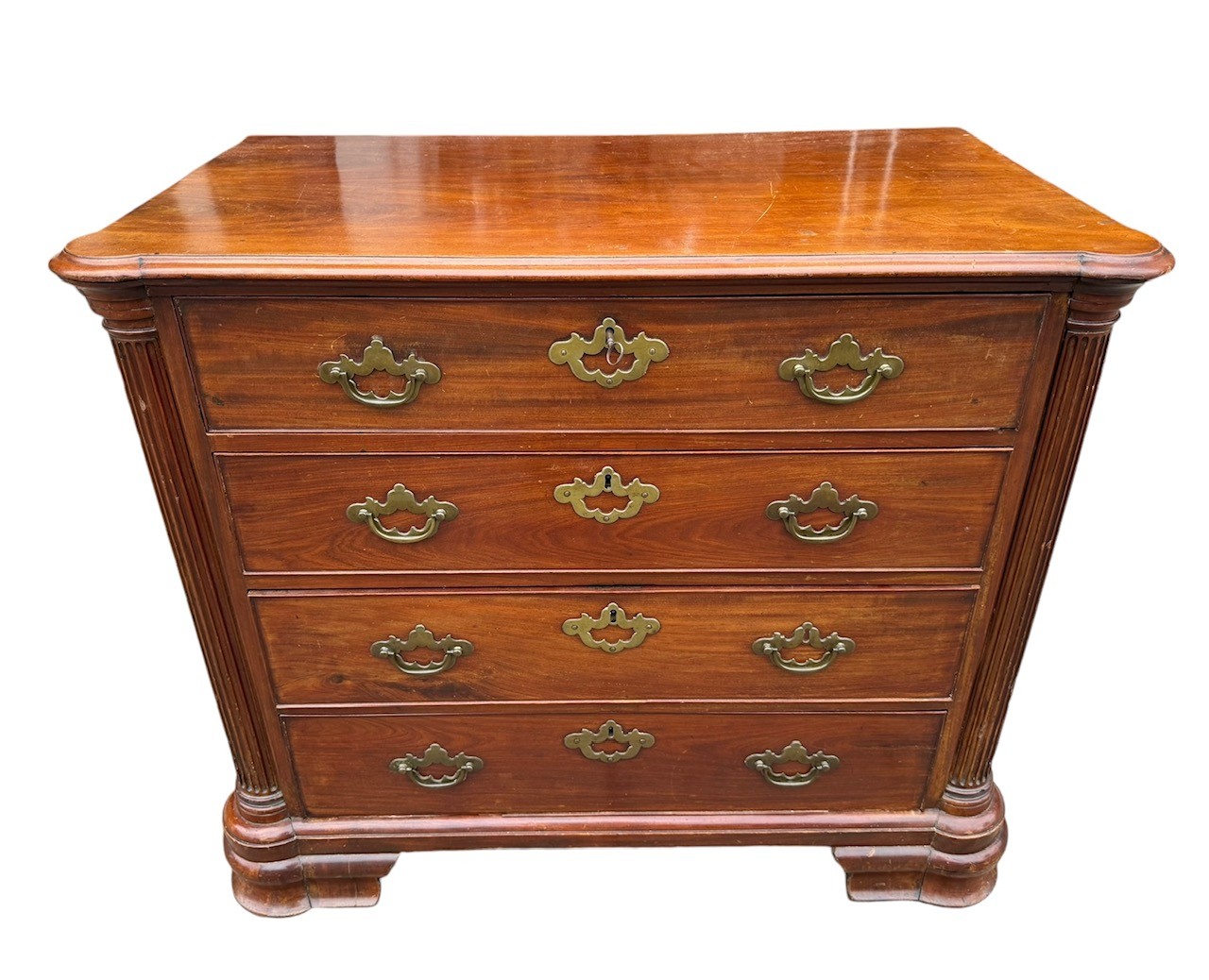 MANNER OF GILLOW, A GEORGE III MAHOGANY SECRETAIRE CHEST Of four long graduate drawers flanked by