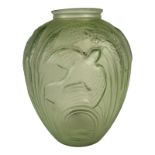 JOBLIN, A LARGE ART DECO BIRD AND CORN GREEN GLASS VASE Embossed with a bird in flight with corn. (