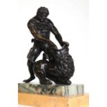 A patinated bronze figure group after the antique,