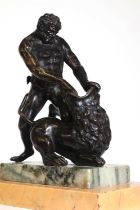 A patinated bronze figure group after the antique,