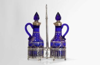 A pair of Bristol blue glass decanters,