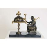 A chinoiserie gilt and patinated bronze desk bell,