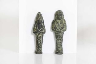 A pair of Egyptian-style clay ushabti figures,