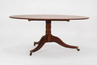 A George III mahogany breakfast table,