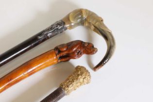 A horn, silver-mounted and stained hardwood walking stick