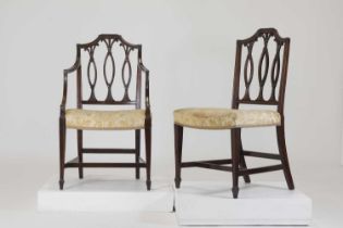 A set of eight George III-style mahogany dining chairs,