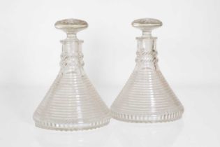 A pair of cut-glass ship's decanters,