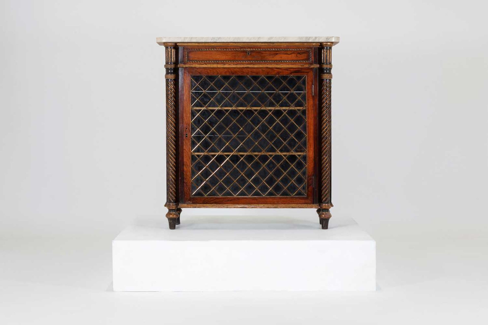 A Regency rosewood, painted and parcel-gilt pier cabinet,