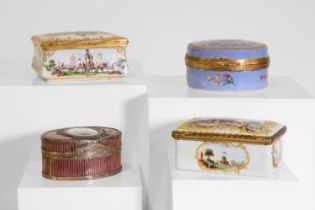 A group of enamel and metal-mounted boxes,