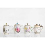 A group of three Meissen porcelain mustard pots and covers,