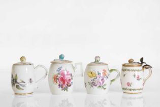 A group of three Meissen porcelain mustard pots and covers,