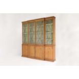 A George III pine breakfront library bookcase,