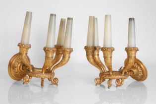 A pair of Directoire ormolu four-light wall appliqués,