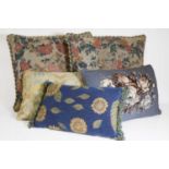 A group of five cushions,