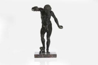 A grand tour patinated bronze figure, after the antique,