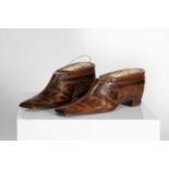 A pair of treen snuff shoes,
