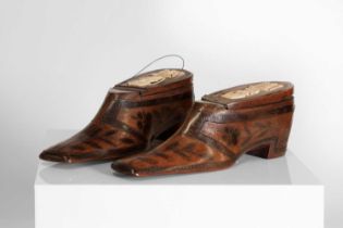 A pair of treen snuff shoes,