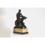 A patinated bronze figure after the antique,