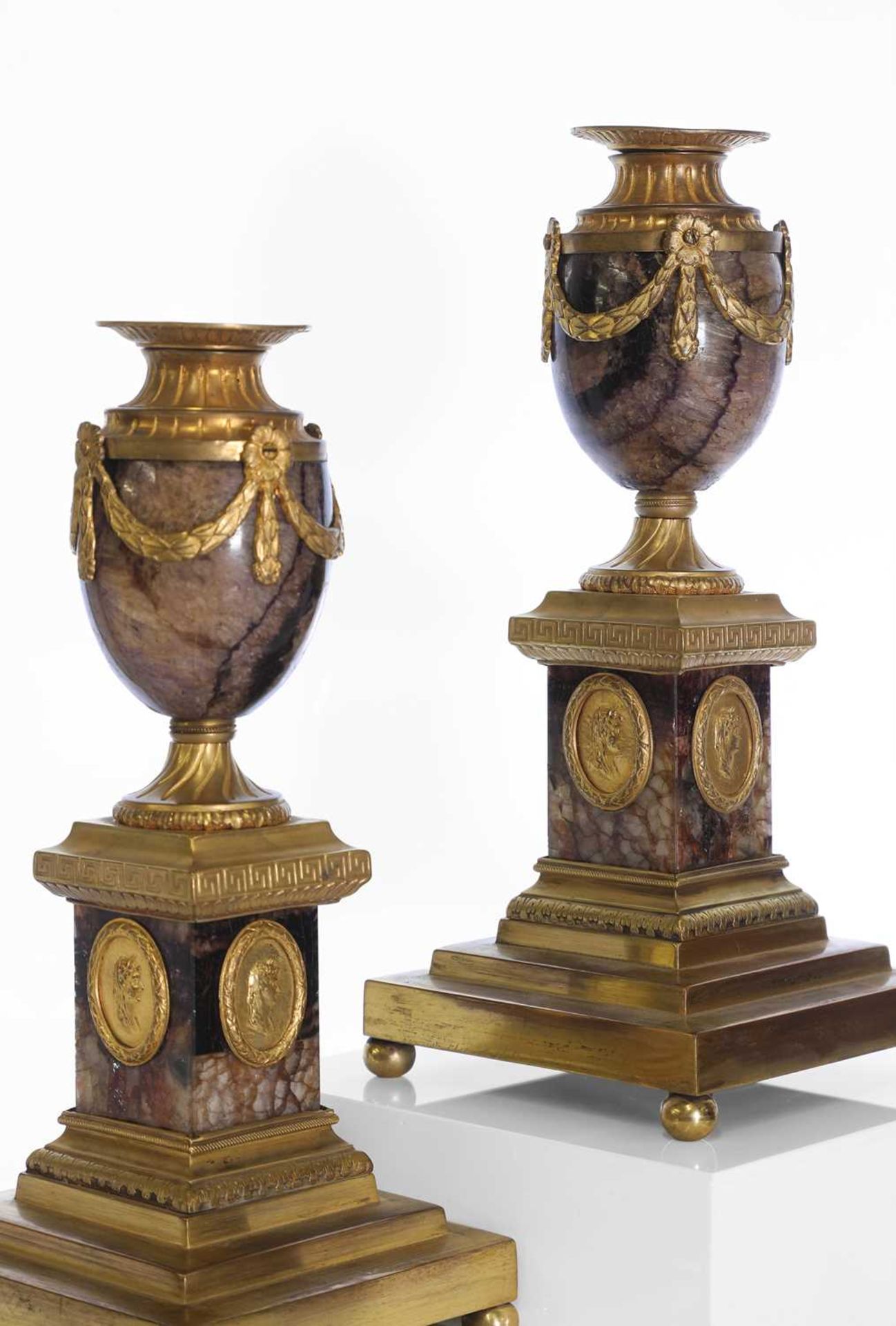 A pair of George III Derbyshire Blue John and ormolu 'Cleopatra' candle vases,