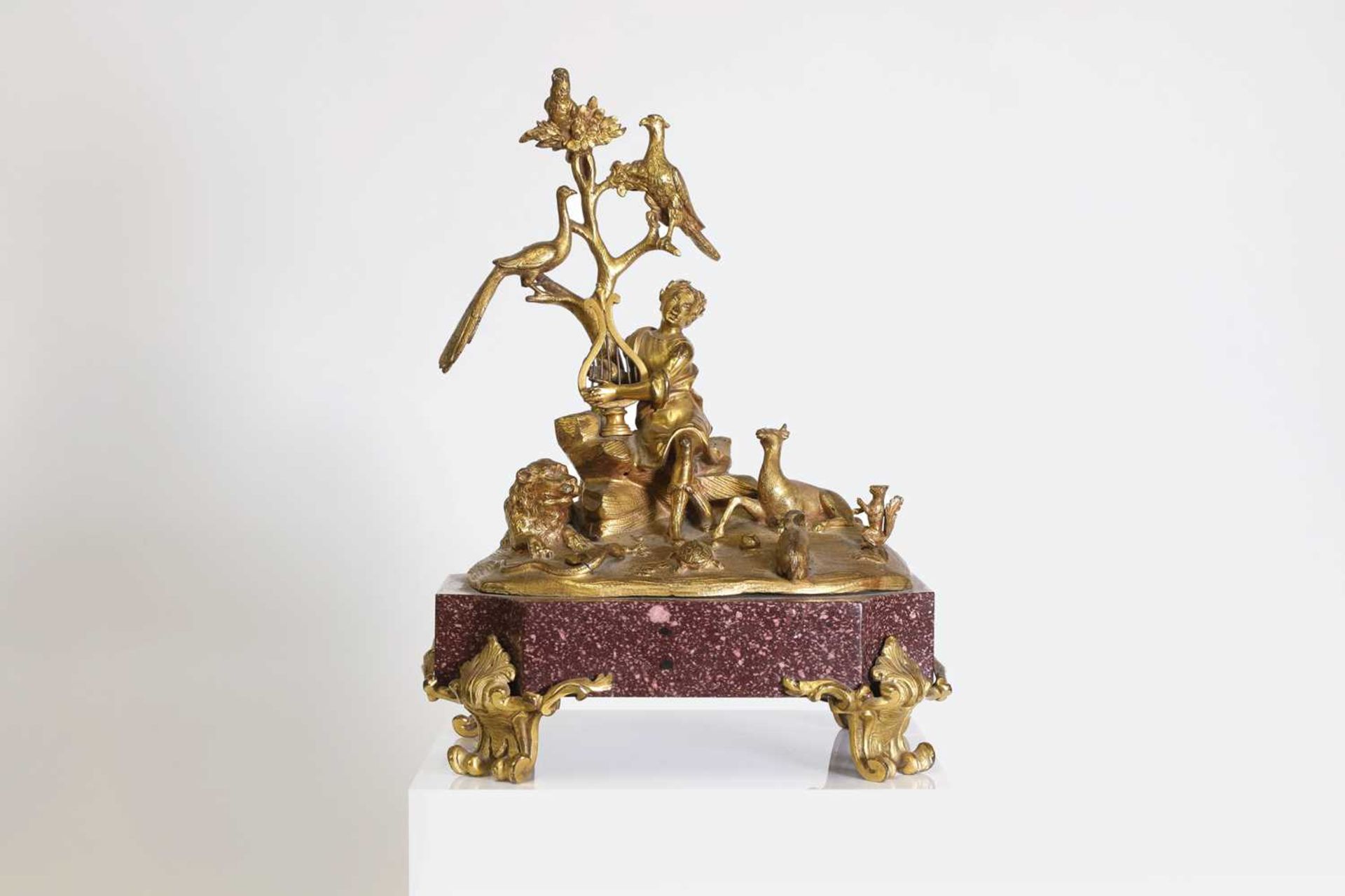 An ormolu and porphyry figure group,