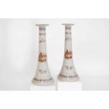 A pair of export porcelain candlesticks,