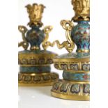 A pair of gilt-metal-mounted cloisonné candlesticks,