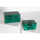 Two malachite veneered jewellery boxes or caskets,