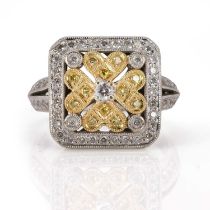 A bi-coloured gold yellow and white diamond dress ring,