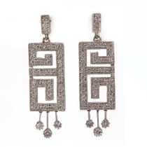 A pair of white gold diamond drop earrings,