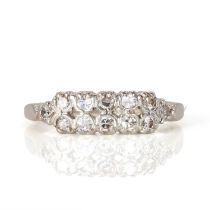 A white gold diamond ring in a double row,