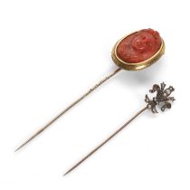 An antique coral cameo stick pin and a seed pearl stick pin,